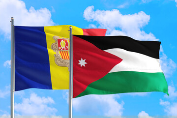 Jordan and Andorra national flag waving in the windy deep blue sky. Diplomacy and international relations concept.