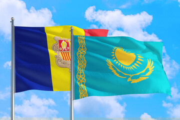 Kazakhstan and Andorra national flag waving in the windy deep blue sky. Diplomacy and international...