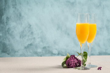 Two glasses of mimosa cocktail - 390969045