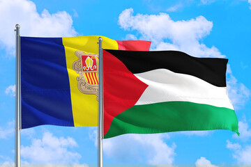 Palestine and Andorra national flag waving in the windy deep blue sky. Diplomacy and international...