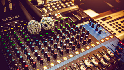 Close-up microphones and audio mixer in studio concepts room for sound control and recording...