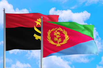Eritrea and Angola national flag waving in the windy deep blue sky. Diplomacy and international relations concept.