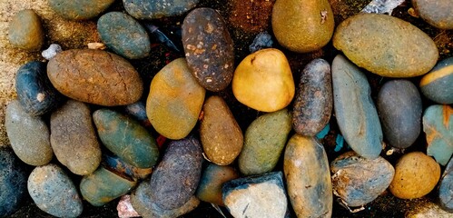 The​ rocks​ are​ by​ the​ sea.