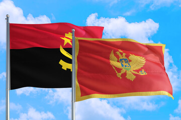 Montenegro and Angola national flag waving in the windy deep blue sky. Diplomacy and international relations concept.