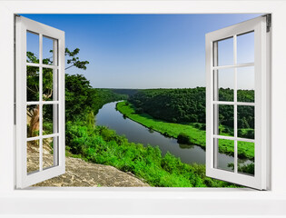 tropical landscape view from an open window to the river