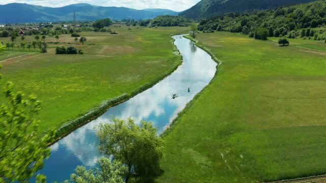 Croatia in Summer, Aerial view of Kayaks on Gacka River in Countryside