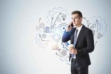 Businessman with coffee on phone, gears sketch
