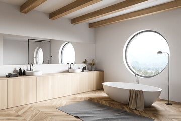 White loft bathroom corner with tub and sink
