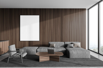 Dark wooden living room interior with sofa and poster