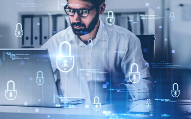 Bearded man with laptop and cyber security interface