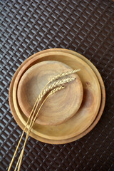 Modern minimalistic wooden dishes or plates. Kitchen decor and cozy home. Eco-friendly tableware and zero plastic concept