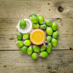 Still life with feijoa fruits and feijoa jam in the jar