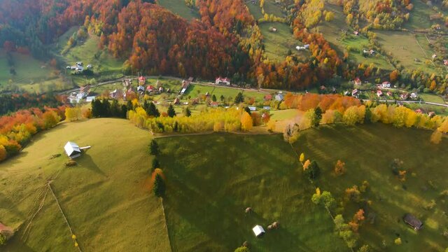 Timelapse and aerial footage over Transylvanian village in Romanian Carpathian mountains , Romania landscape 