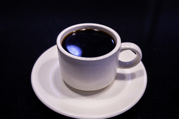 White Coffee Cup with Americano black coffee on black