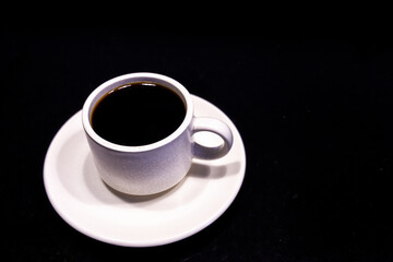 White Coffee Cup with Americano black coffee on black