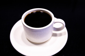 White Coffee Cup with Americano black coffee on black