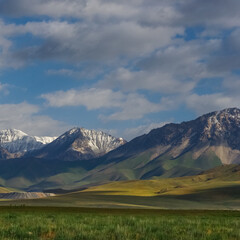 View of the countryside near Sary Tash in southern Kyrgyzstan with snow-capped Alay or Alai mountain range in the backdrop