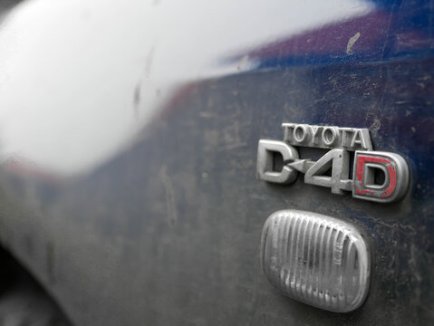 Miercurea Ciuc, Romania- 08 November 2020: D4D Toyota engine sign on dirty used car.