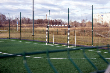 A deserted soccer field with a goal during the COVID-19 virus pandemic
