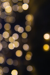 Background of New Year's garlands like stars. Christmas atmosphere with garlands in defocus.