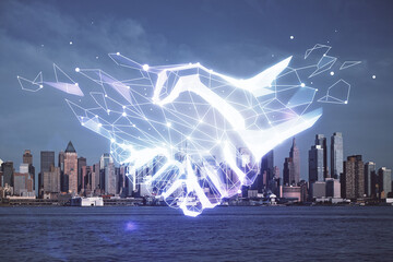 Double exposure of handshake hologram over city view background. Concept of partnership.
