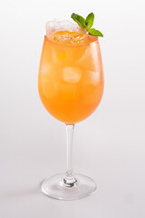 Summer refreshing cocktail with ice and alcohol. Sparkling water, prosecco, Campari, passion fruit syrup.