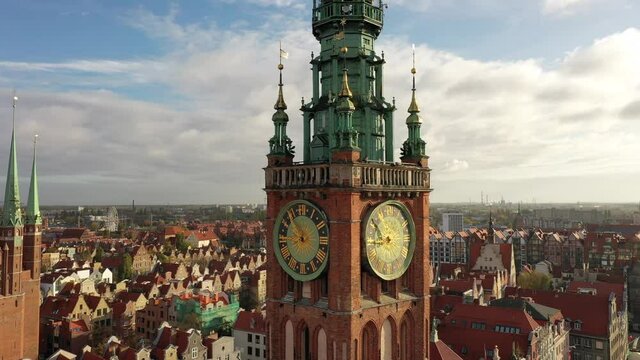 Beautiful clock of the town hall in Gdansk at sunrise, Poland