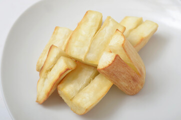 Fried Cassava on a white plate