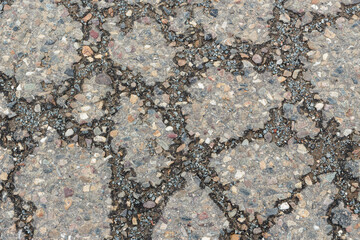 Gray concrete, gravel and small stones textured background