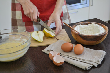  Process of cooking bakery. Baking ingredients for pear pie. Woman preparation pie