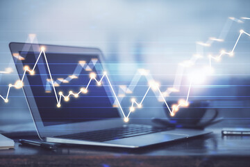 Forex Chart hologram on table with computer background. Double exposure. Concept of financial markets.