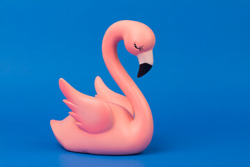 Pink Flamingo  isolated on blue background