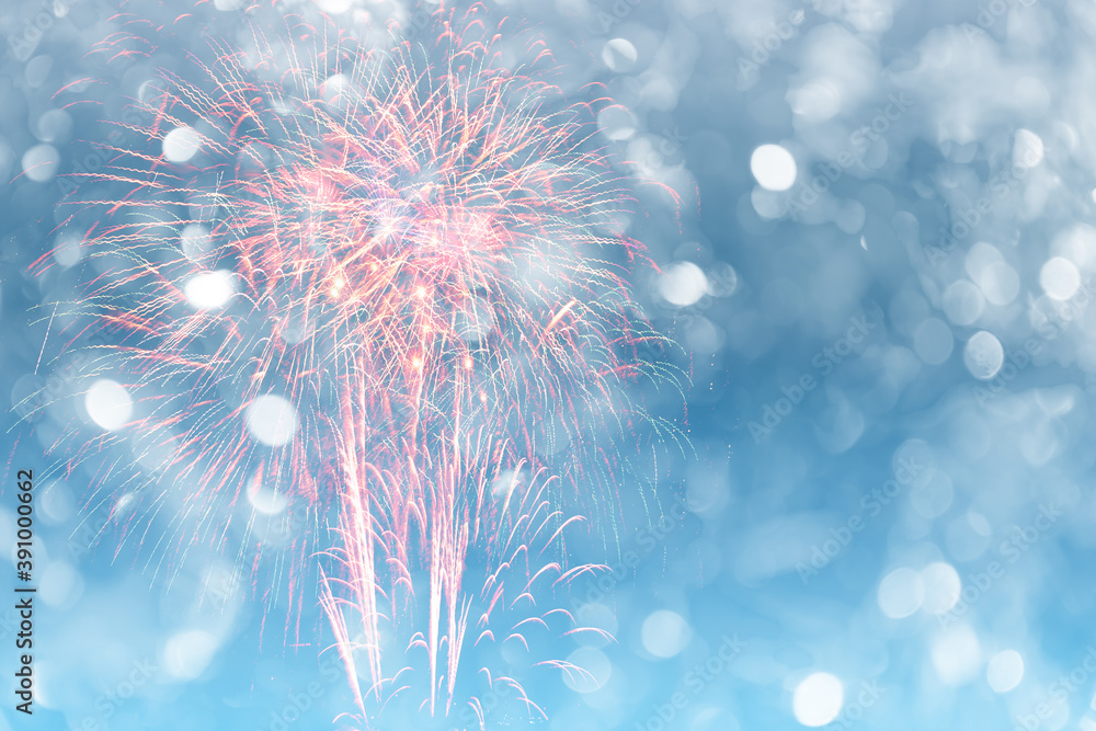 Wall mural colorful of fireworks display on bokeh light in pastel colored for background.