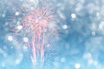 Colorful of fireworks display on bokeh light in pastel colored for background.