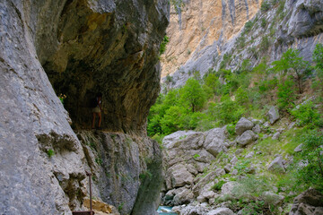 Path dug in the cliff of a mountain