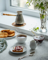 turkish coffee on breakfast with toasts and jam