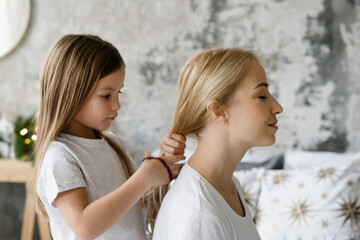 Mother and daughter spending time at home