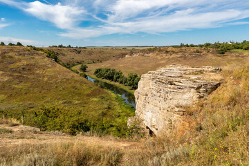 View of the cliffs near the Vorgol river and the surrounding landscape. Tourist and rock climbing place near the city of Yelets, Lipetsk region, Russia