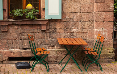 Photo of an empty street cafe in Germany. Lockdown in Europe.