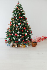 New year interior with Christmas tree with gifts decor garland December