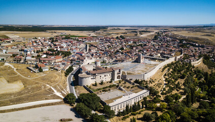 Aerial view of Cuellar, a small old town in the province of Segovia, with the reconstructed castle in the foreground.