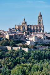 Obraz premium Low angle view of the side façade of the Cathedral of Segovia, located in the main square of the city, the Plaza Mayor, and dedicated to the Virgin Mary.
