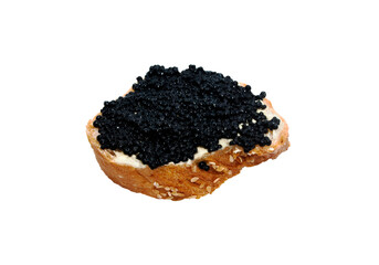 Black caviar served on bread isolated. 
Sandwich with butter and black caviar on a white plate.