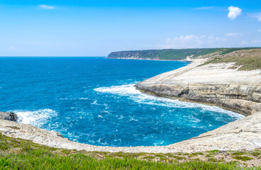 Blue sea and rocks in the sardinian west coast