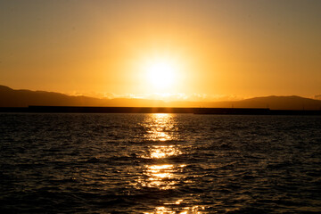 Sea sunset over the ocean coast orange sunset