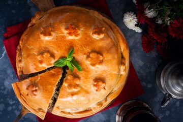 Festive Russian pie kurnik on the table, top view, horizontal © Анна Журавлева