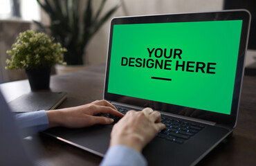 Laptop, Notebook, tablet pc Mockup screen with green chroma key background and text Your Design...
