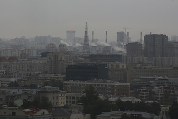 Moscow gloomy view of the city from above, smok ecology city view © kichigin19