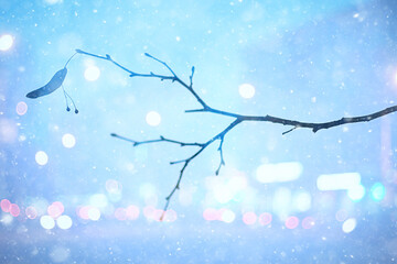 abstract snow blurred background city lights, winter holiday new year