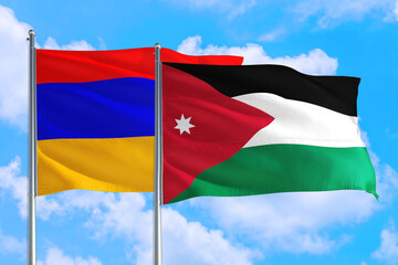 Jordan and Armenia national flag waving in the windy deep blue sky. Diplomacy and international relations concept.